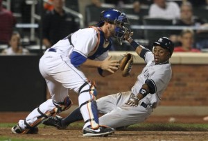 hi-res-117886418-curtis-granderson-of-the-new-york-yankees-slides-safely_crop_north