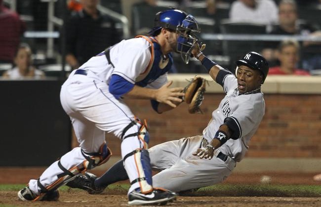 hi-res-117886418-curtis-granderson-of-the-new-york-yankees-slides-safely_crop_north